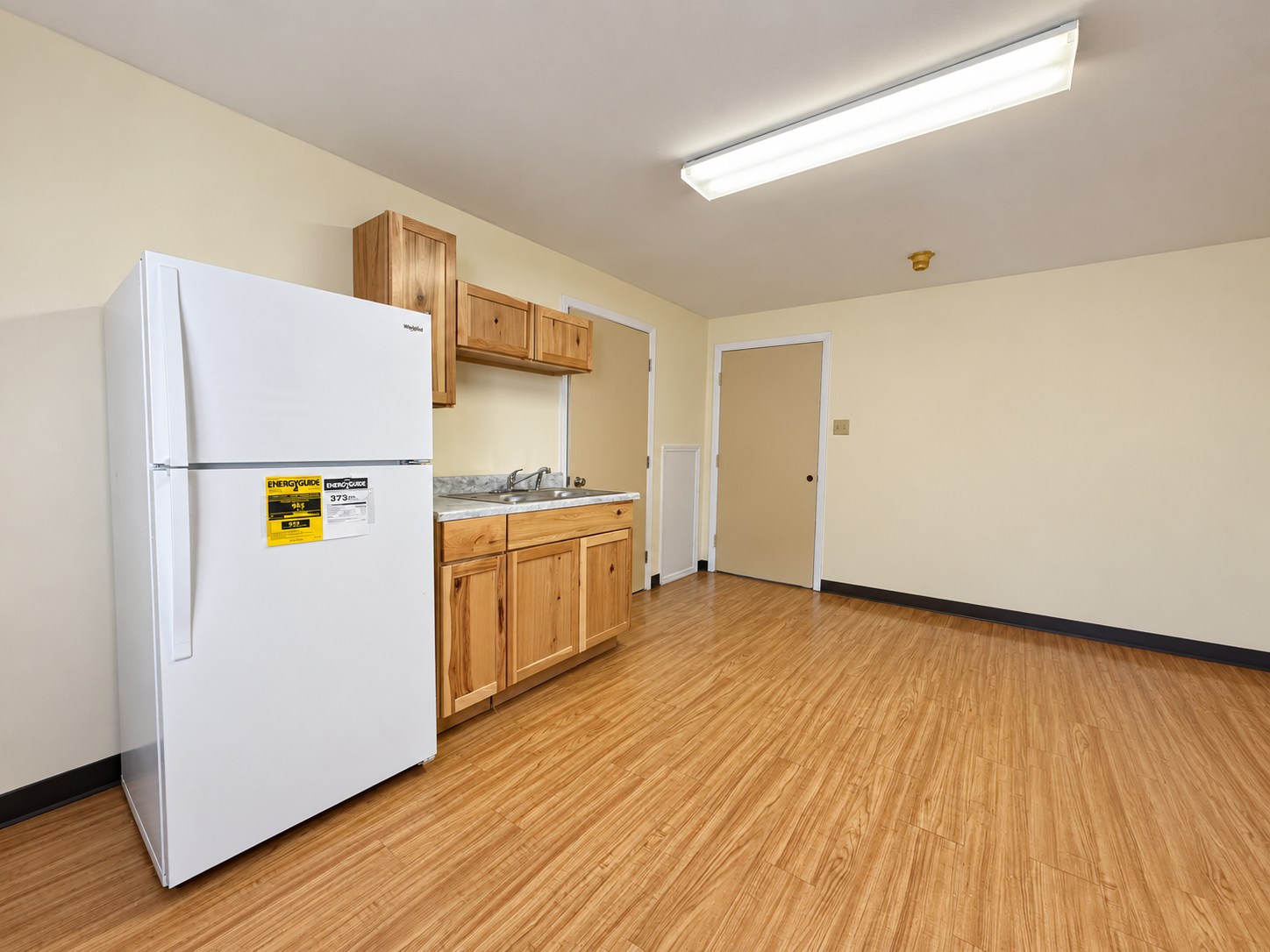 Blue Ridge room example 1 — Room and refrigerator