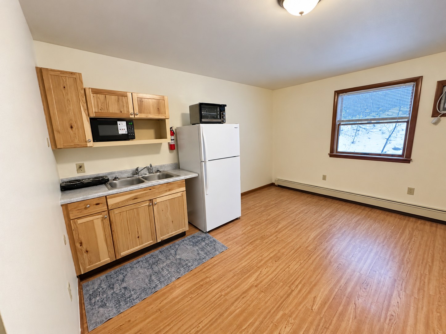 Blue Ridge room example 2 — Kitchenette and window