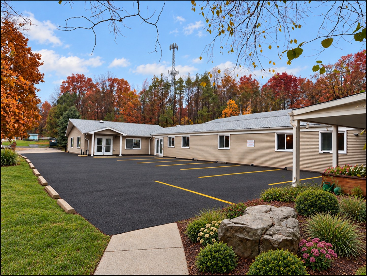 Exterior and parking area of Blue Ridge Efficiency Apartments