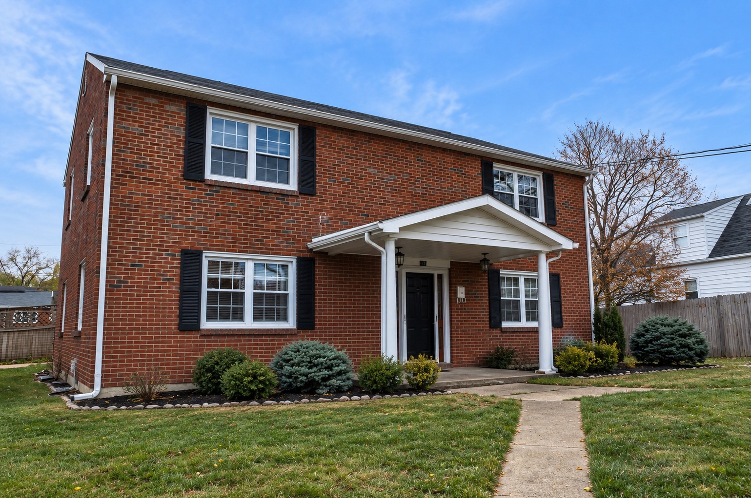 Exterior of the brick duplex at 319 and 321 Chestnut Street
