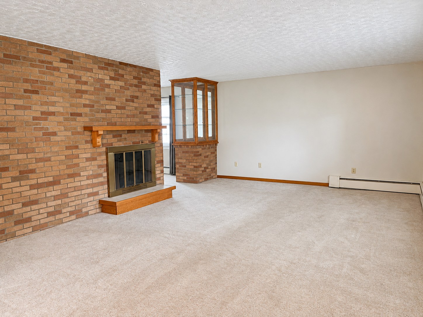 317 Chestnut Street — Living room with brick fireplace