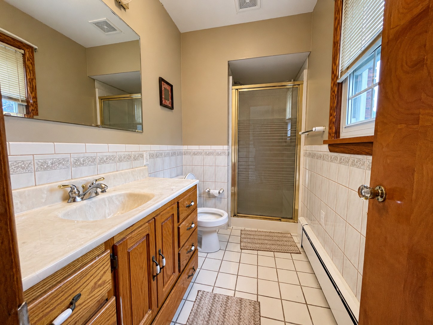 317 Chestnut Street — Bathroom vanity and shower